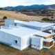 Rear view of the new Pressing Matters winery processing building set in the rural countryside of Tea Tree.