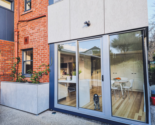 Allison Residence, Sandy Bay by BPSM Architects - exterior bi-fold doors