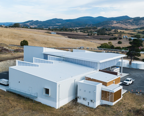 Rear view of the new Pressing Matters winery processing building set in the rural countryside of Tea Tree.